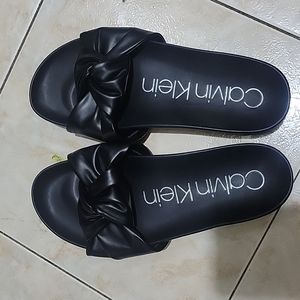 Calvin Klein flat sandals black size 9 leather bow chaya very nice out round toe